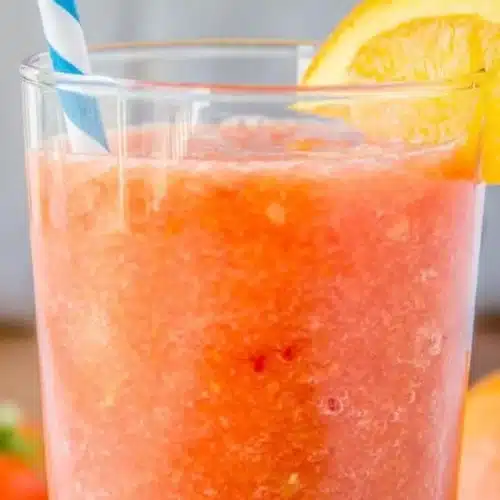 Bright Breakfast Smoothie with fruits and greens in a glass