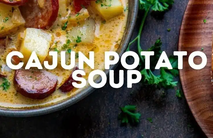 Bowl of Cajun Potato Soup garnished with green onions and spices