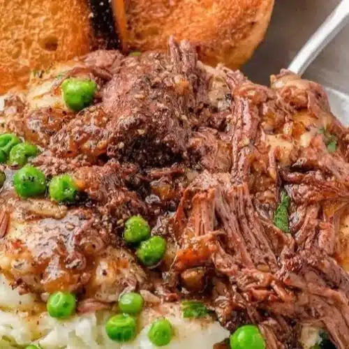 Delicious French onion pot roast served with caramelized onions and herbs.