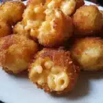Crispy Fried Mac and Cheese Bites served on a plate