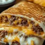 Easy grilled cheese burrito with melted cheese and crispy tortilla