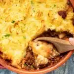 Delicious Lentil Shepherd's Pie topped with fluffy mashed potatoes ready to serve.