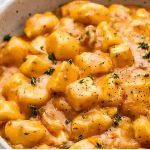 Delicious Marry Me Tofu dish garnished with herbs and served in a bowl