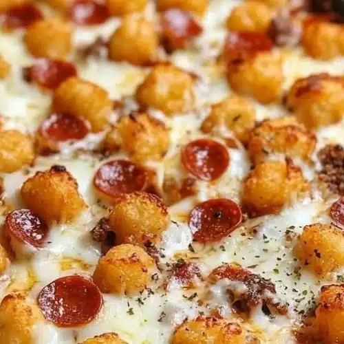 Delicious Pizza Tot Casserole served in a baking dish with toppings