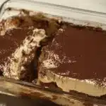 Delicious protein-packed tiramisu dessert served in a glass dish