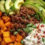 Delicious sweet potato taco bowl topped with fresh ingredients