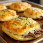 French Dip Biscuit Bombs served with au jus for dipping