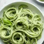 Creamy Avocado Pesto Zucchini Noodles served in a bowl.