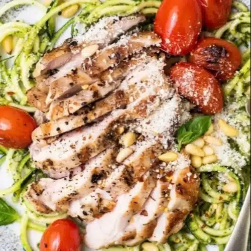 Delicious Chicken Zucchini Pasta with Pesto served in a bowl