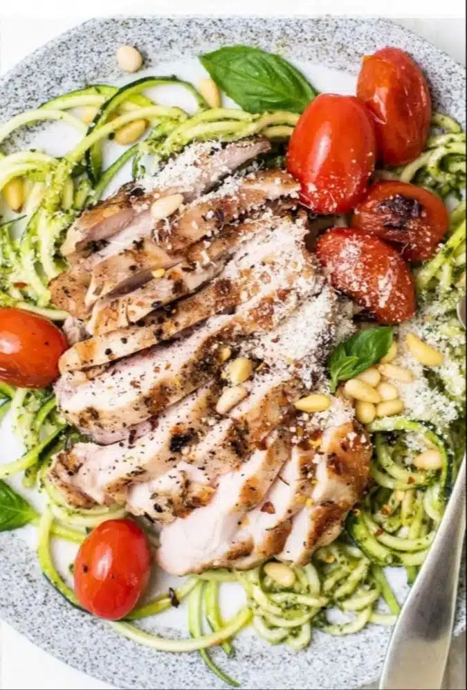 Delicious Chicken Zucchini Pasta with Pesto served in a bowl