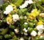 Fresh asparagus salad with lemon dressing and cherry tomatoes