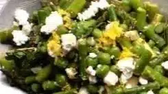 Fresh asparagus salad with lemon dressing and cherry tomatoes