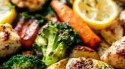 Sheet Pan Lemon Herb Chicken and Vegetables with fresh herbs and vibrant colors