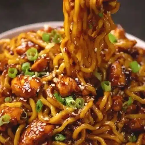 Delicious Sticky Garlic Chicken Noodles served in a bowl