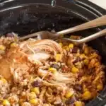 Delicious slow-cooker chicken burrito bowls with colorful toppings