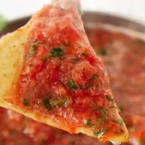 Bowl of easy homemade salsa with fresh ingredients and vibrant colors