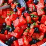 Honey Lime Mint Watermelon Berry Fruit Salad with colorful fresh fruits