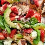 Strawberry Avocado Spinach Salad with Chicken in a bowl