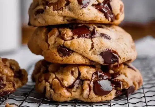A plate of giant chocolate chip cookies fresh out of the oven